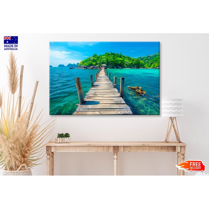 Wooden Pier Leads to An Island with Clear Blue Water and Lush Greenery Wall Art Decor 100% Australian Made