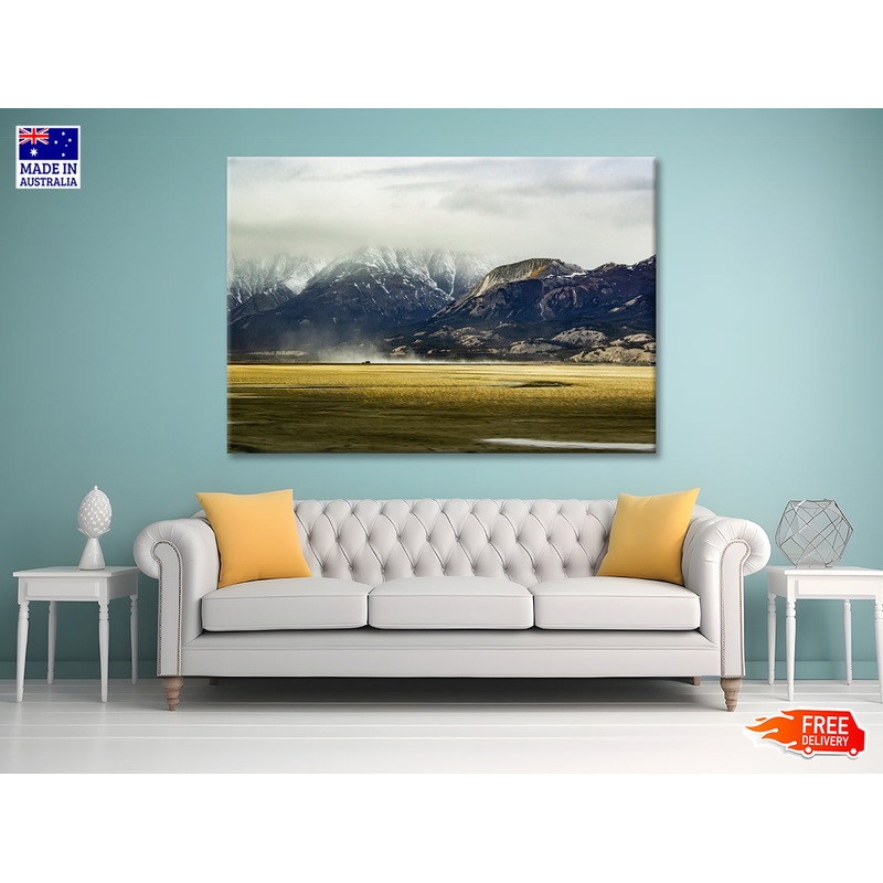 A Field with Mountains, Clouds, Snow, and Grass Print 100% Australian Made