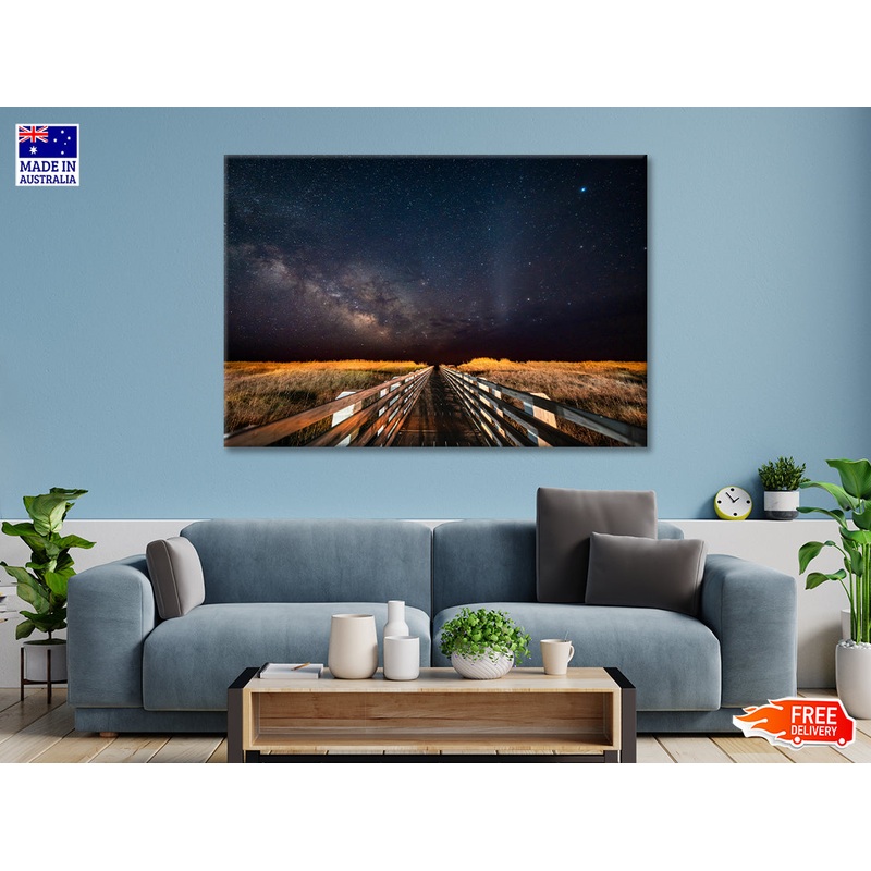 Wooden Bridge across a Meadow under a Starry Sky Print 100% Australian Made